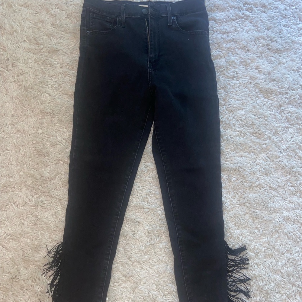 Levi fringe-trimmed ankle black jeans